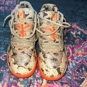 Puma Melos Camouflage Sneakers with Orange Accents